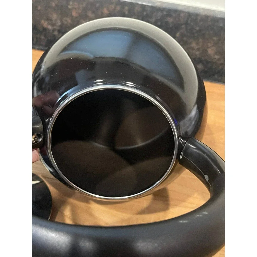 Copco black enameled tea pot with whistler